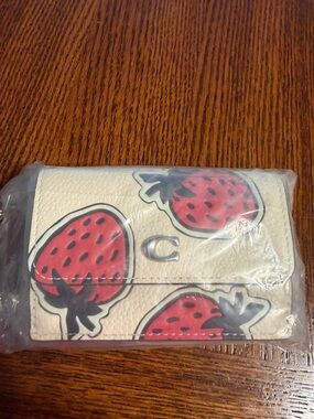 Coach Cream Leather Wallet with Red Strawberry Motif